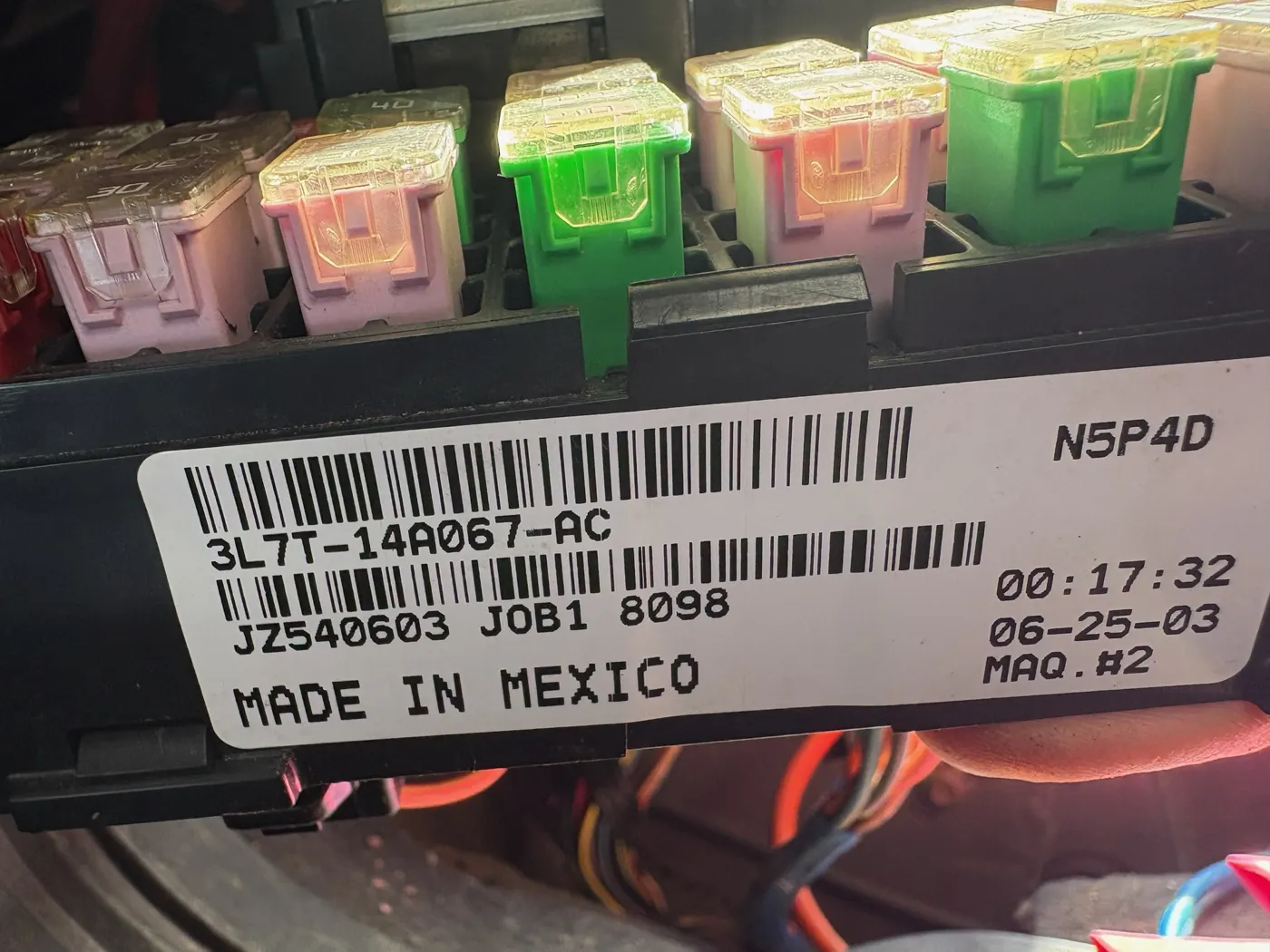 Fuses and relays in a battery junction box