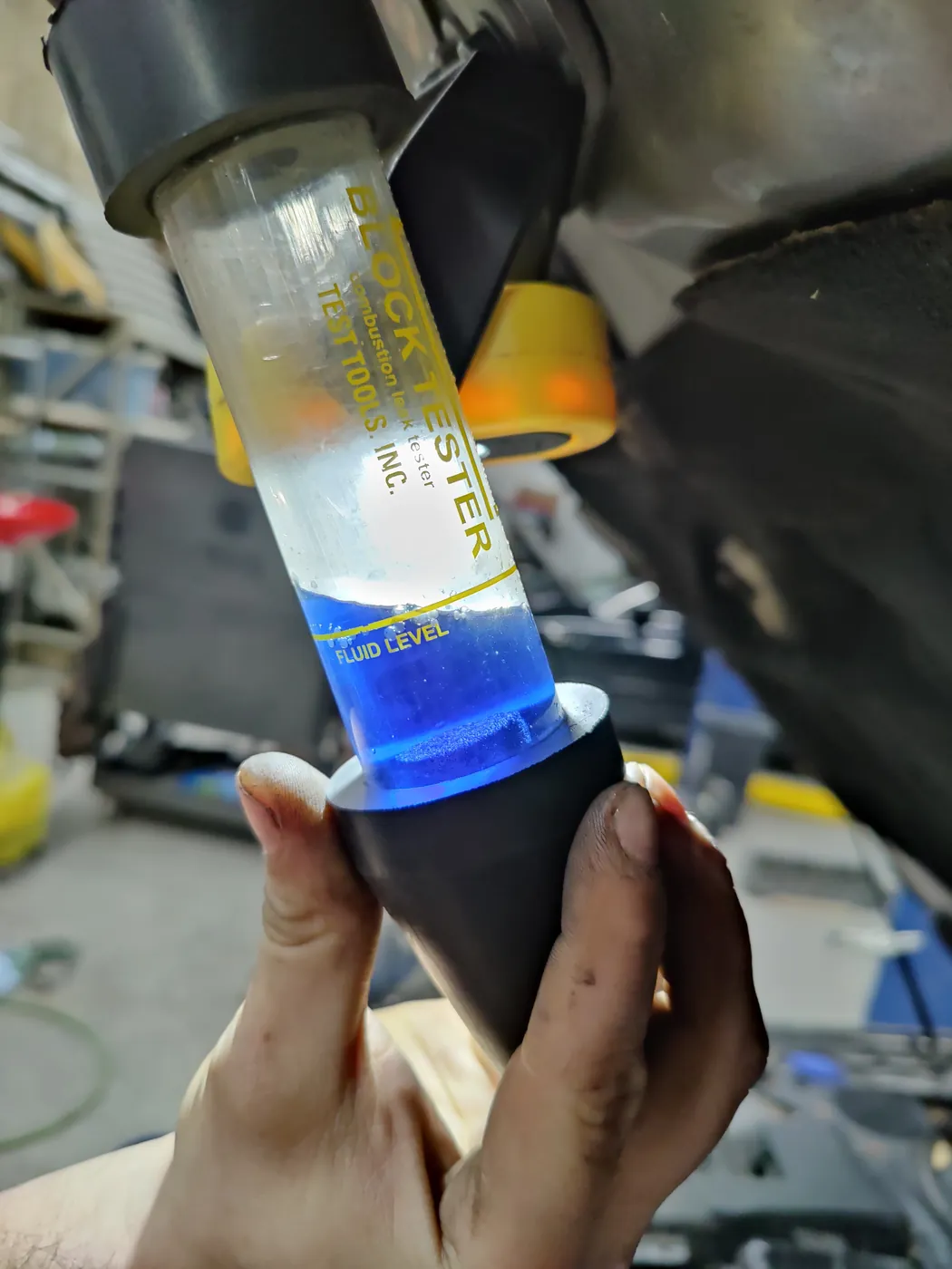 Combustion leak tester checking coolant for exhaust gases, a head gasket test