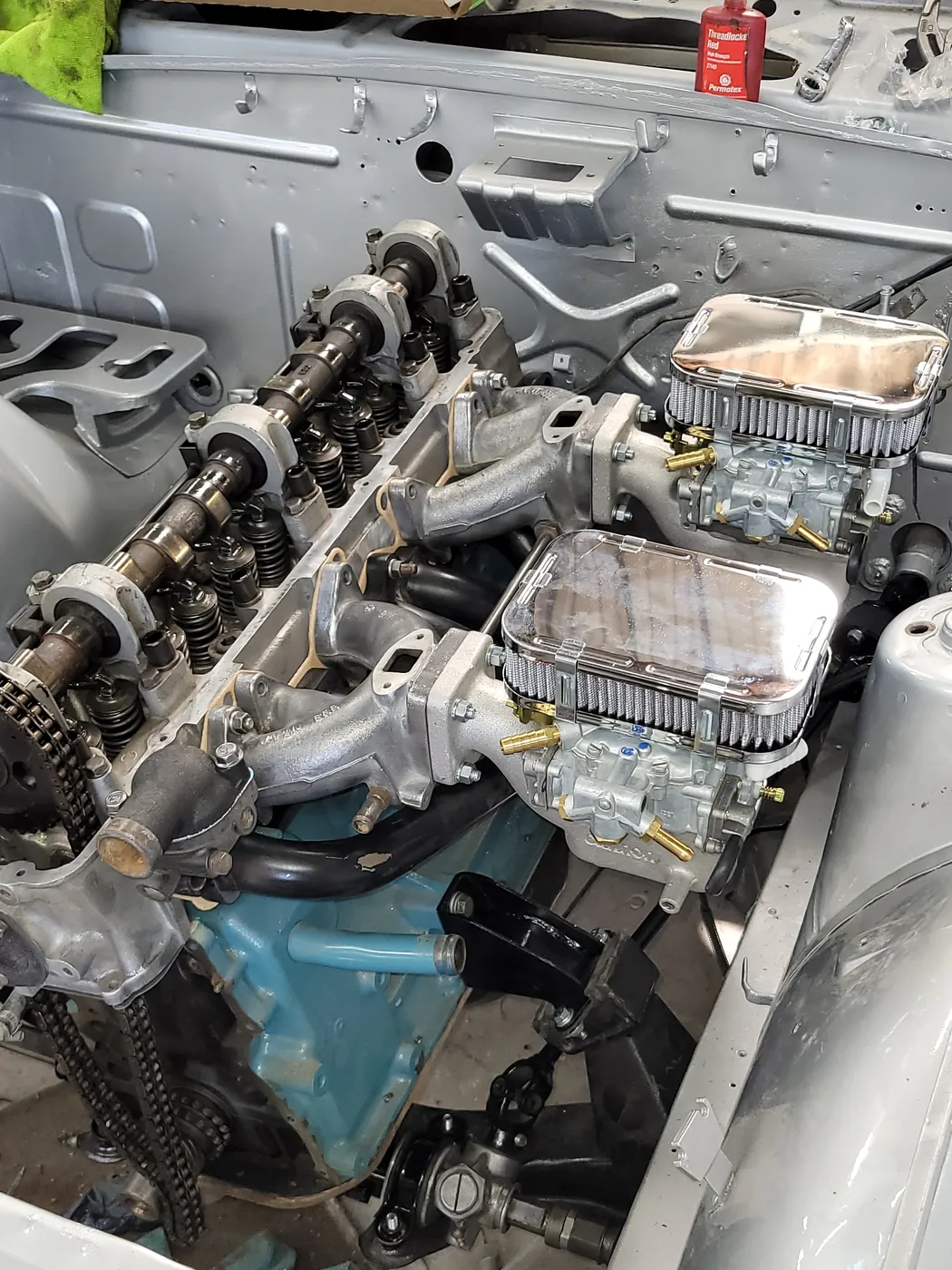 Engine with the camshaft and valve train exposed during a build