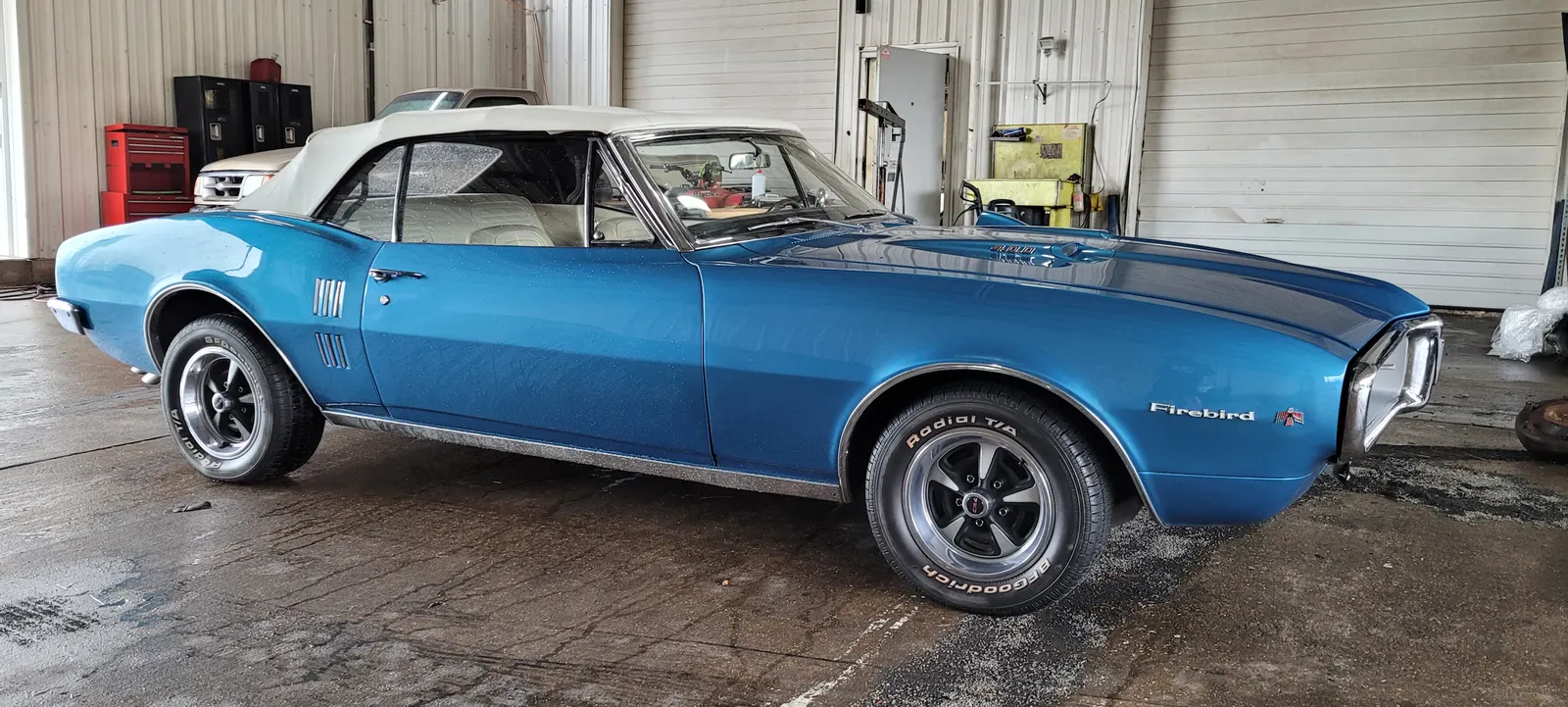 Blue classic Pontiac Firebird convertible