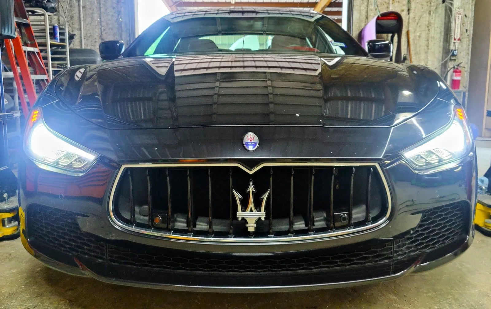 Front of a Maserati Ghibli in the Figure Automotive shop