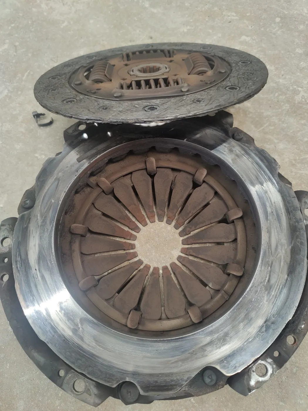Clutch pressure plate removed from a manual transmission car