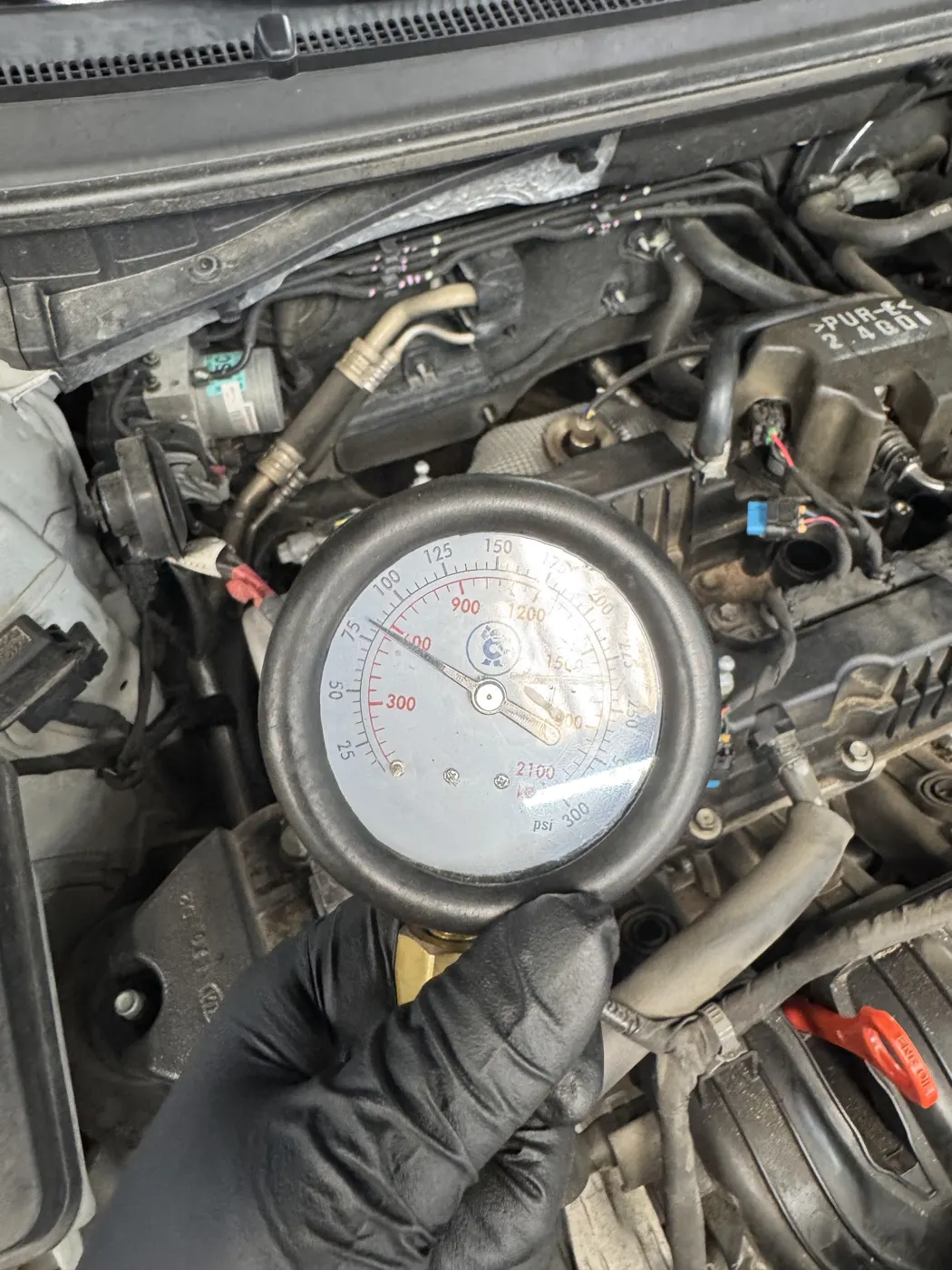 Pressure gauge connected during an engine test