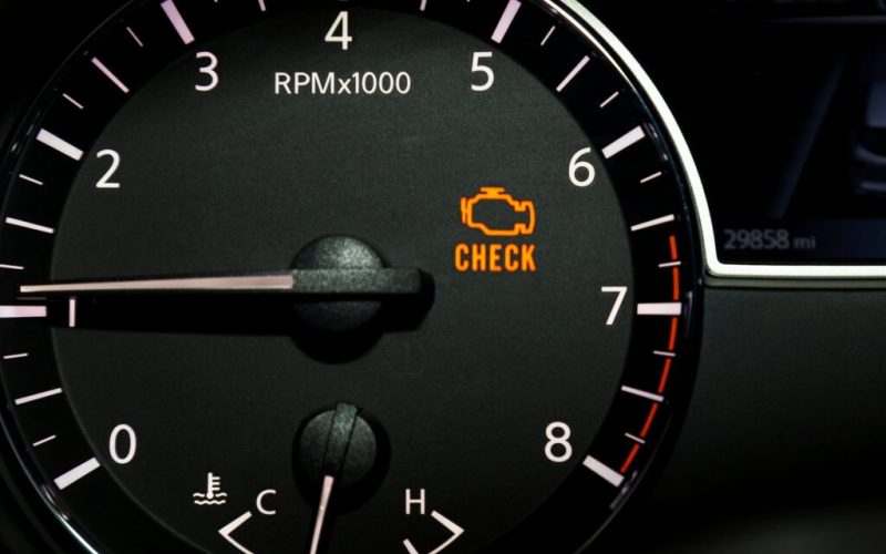 check-engine-light check engine light on vehicle dashboard